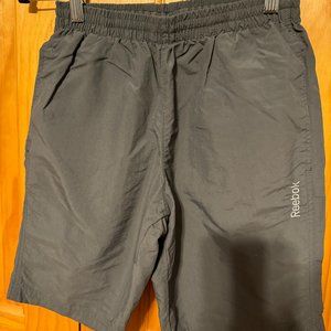 Nearly new grey men's Reebok performance shorts, size Small
